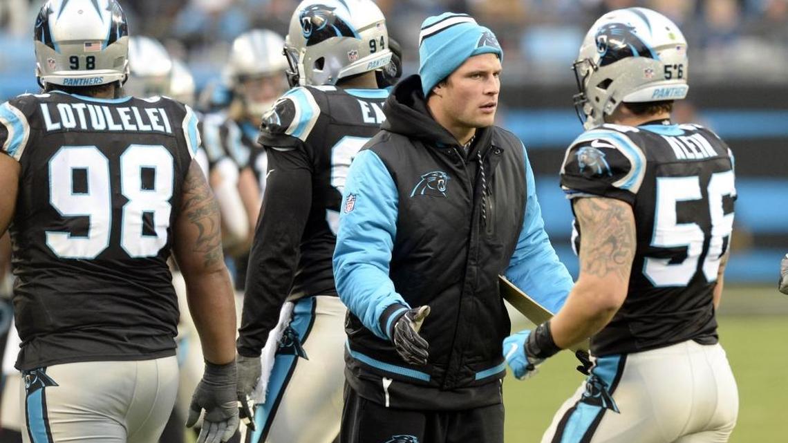 Carolina Panthers middle linebacker Luke Kuechly congratulates the defense as they walk off the field against the San Diego Chargers during the second half at Bank of America Stadium on Sunday, December 11, 2016. The Panthers won 28-16.