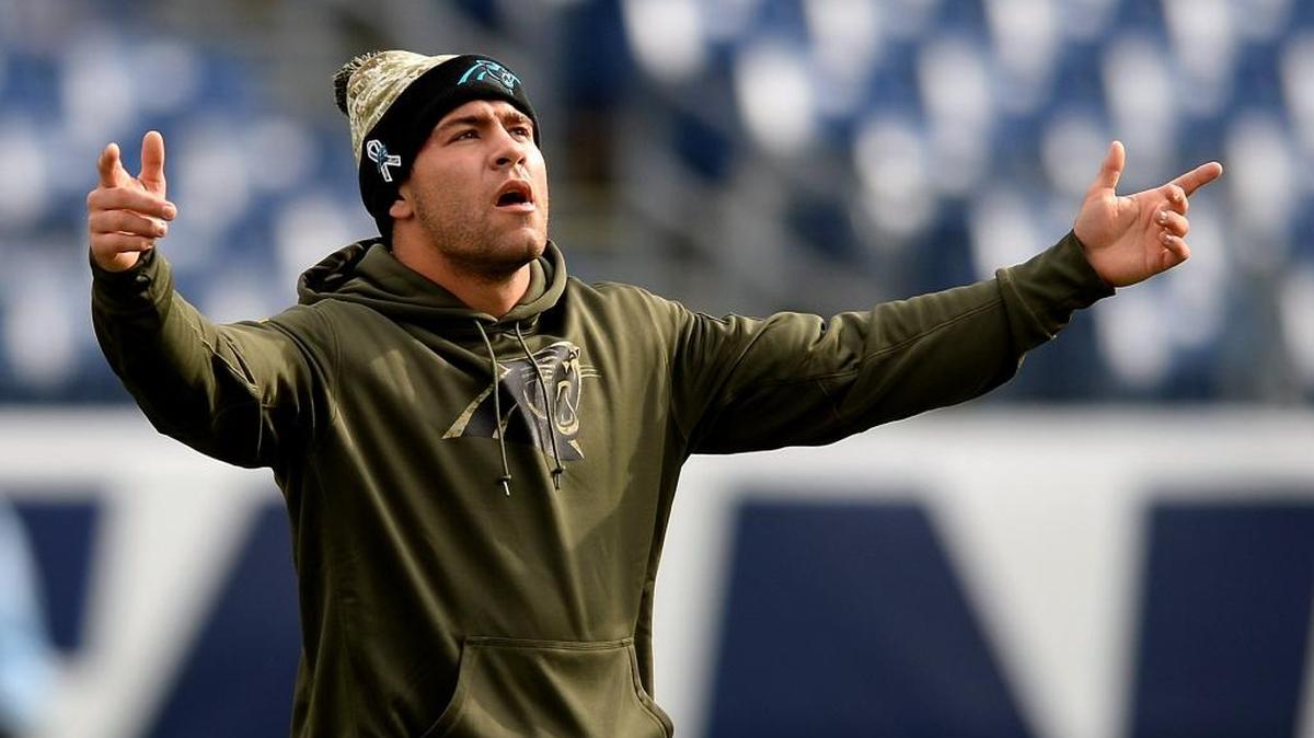 Carolina Panthers running back Brandon Wegher acts like he is singing the National Anthem during a warmup on Nov. 15, before the Panthers played the Tennessee Titans at Nissan Stadium in Nashville.