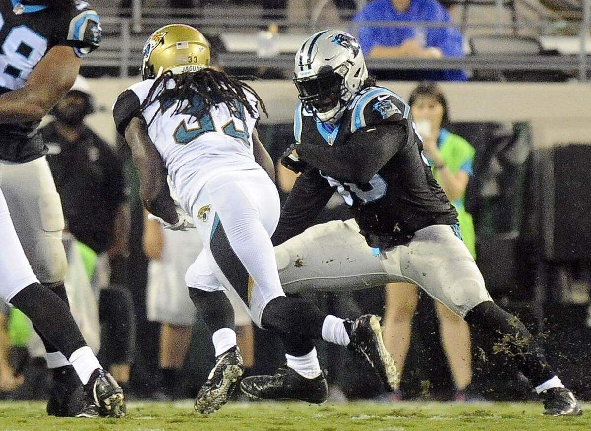 Carolina Panthers defensive end Julius Peppers (90) says the preseason is “just an adjustment period for me as a player, going from outside linebacker back to defensive end.”