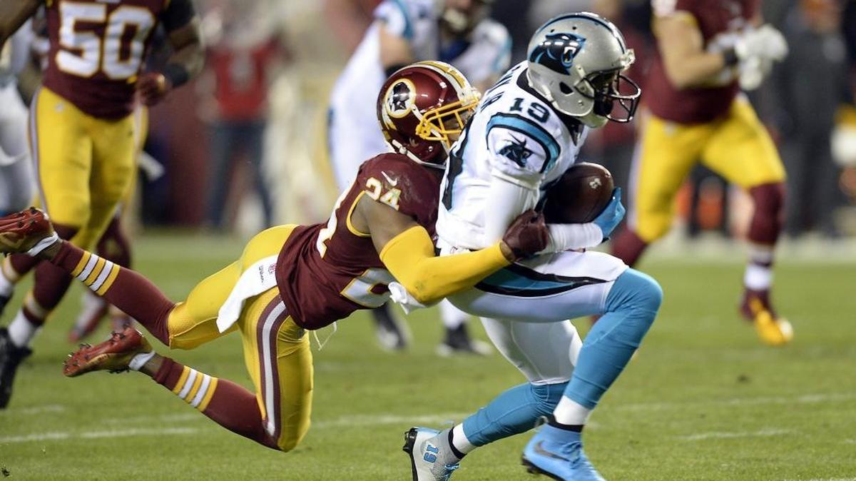 Carolina Panthers wide receiver Ted Ginn Jr. (19) makes a reception in front of Washington cornerback Josh Norman (24) in the first half at FedExField on Monday.