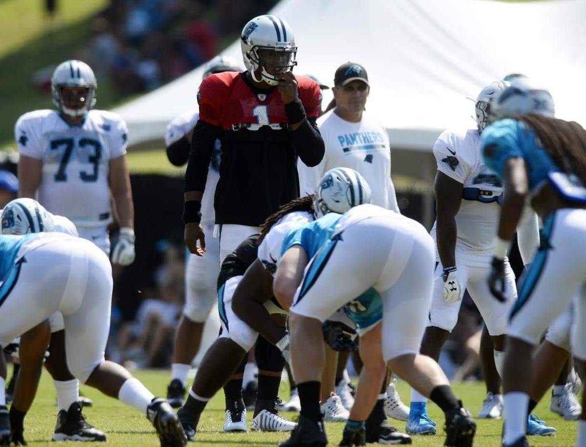 Even though Carolina Panthers quarterback Cam Newton (1) has been limited as a thrower, the staff is trying to work Newton into plays to see how he and the rest of the first-team offense is clicking together.