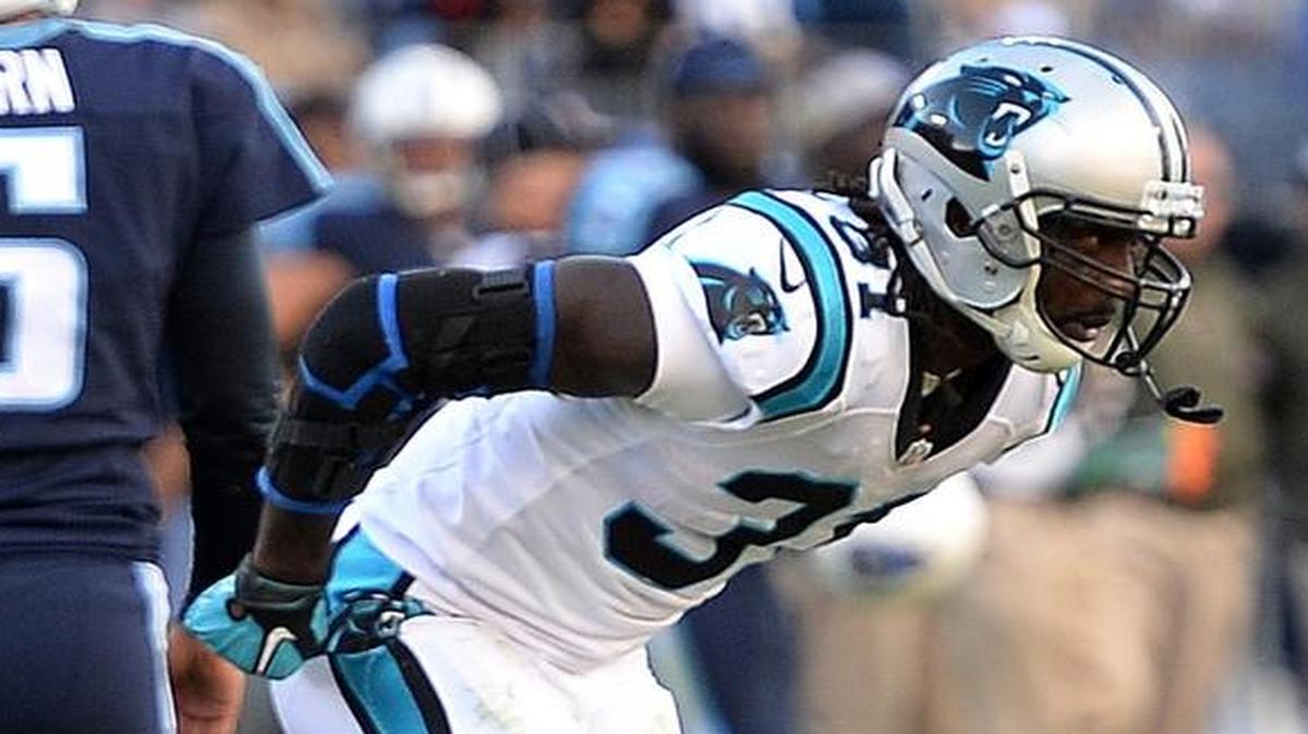 Carolina Panthers cornerback Charles Tillman limps off the field following a series vs the Tennessee Titans during the fourth quarter on Sunday.