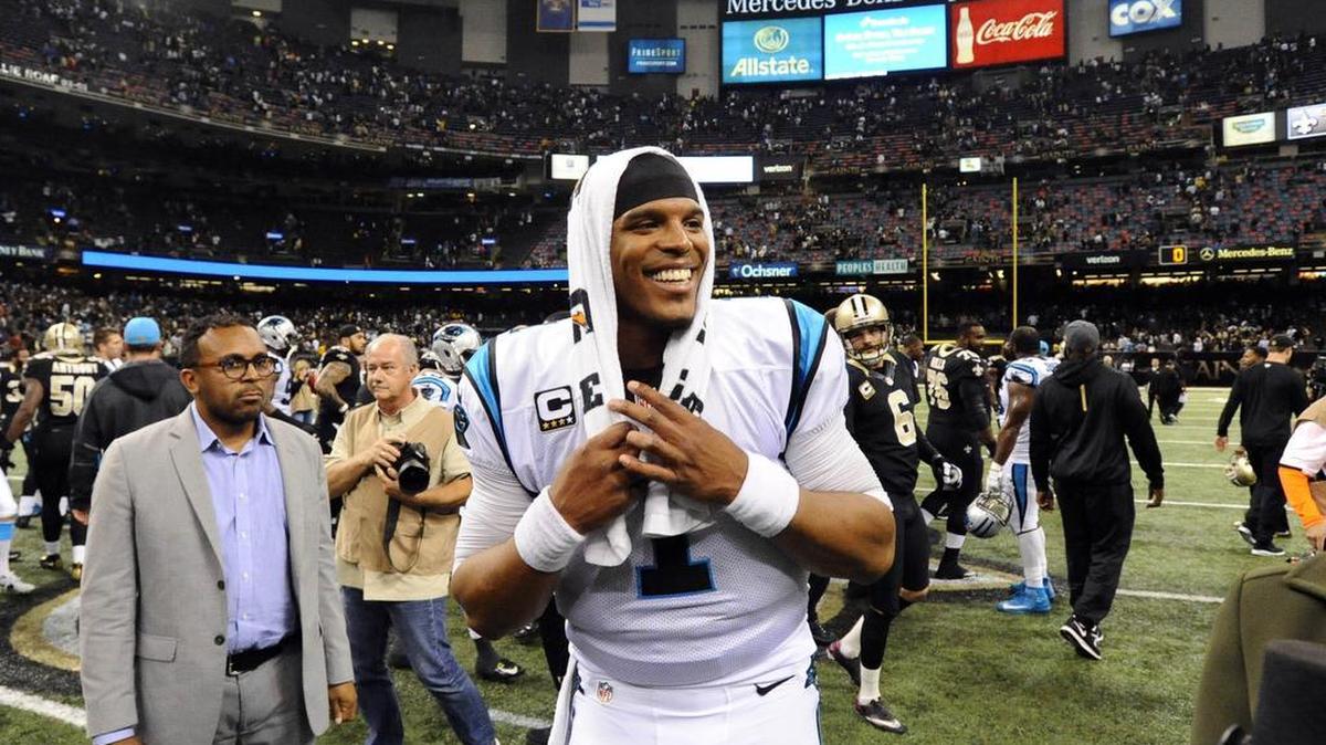 Carolina Panthers' Cam Newton (1) celebrates the the team's 41-38 victory over the New Orleans Saints at Mercedes-Benz Superdome on Sunday, December 6, 2015.