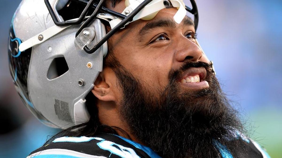 Panthers defensive linemen Mario Addison and Star Lotulelei, above, suffered low ankle sprains in Carolina’s win against Dallas.