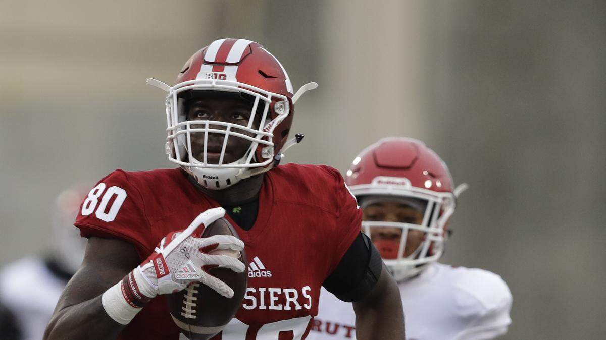 Indiana tight end Ian Thomas (80) runs for a touchdown during the first half of an NCAA college football game against Rutgers, Saturday, Nov. 18, 2017, in Bloomington, Ind. (AP Photo/Darron Cummings)