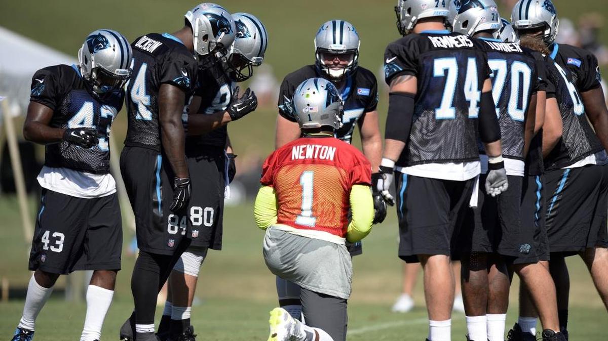 Carolina Panthers' Cam Newton (1) huddles the offense around him during morning practice at Carolina Panthers Training Camp at Wofford College in Spartanburg, SC on Wednesday, August 12, 2015.