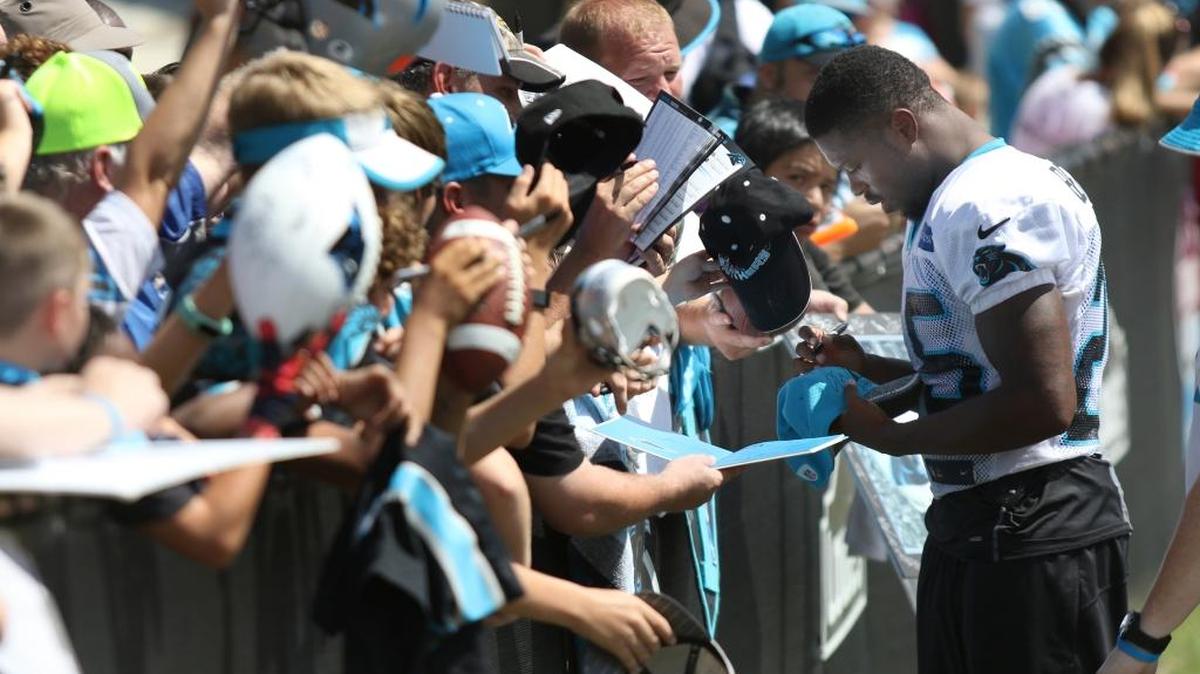 Carolina Panthers cornerback Bene' Benwikere signs autographs for fans on the last day of training camp at Wofford on Tuesday. Benwikere, coming off a broken leg from last season, finished camp strong after a slow start.