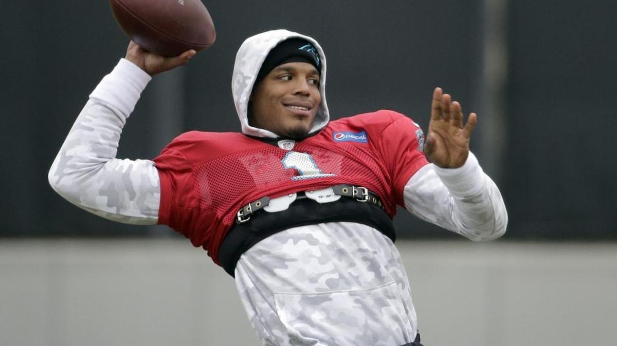 Carolina Panthers quarterback Cam Newton prepares to throw a pass during practice Friday.