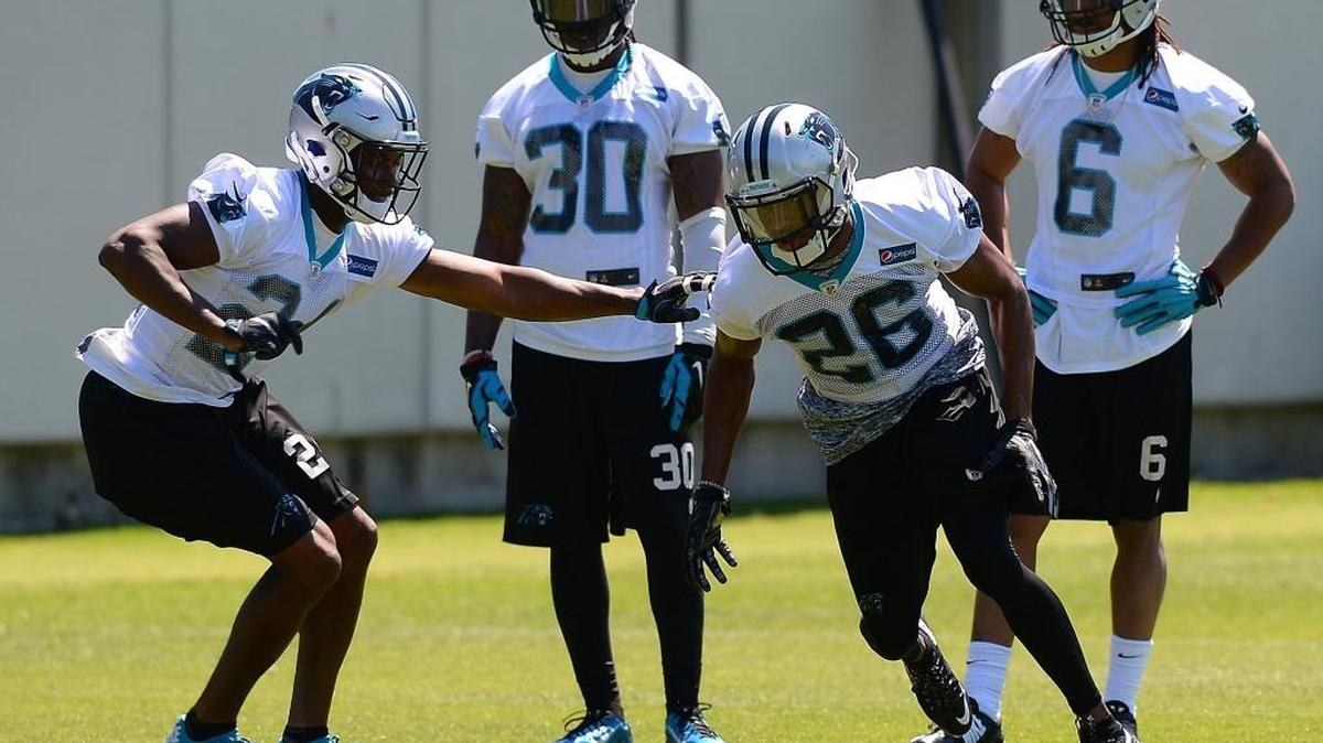 Carolina Panthers cornerbacks James Bradberry, left and Daryl Worley, right, run through a drill at practice.