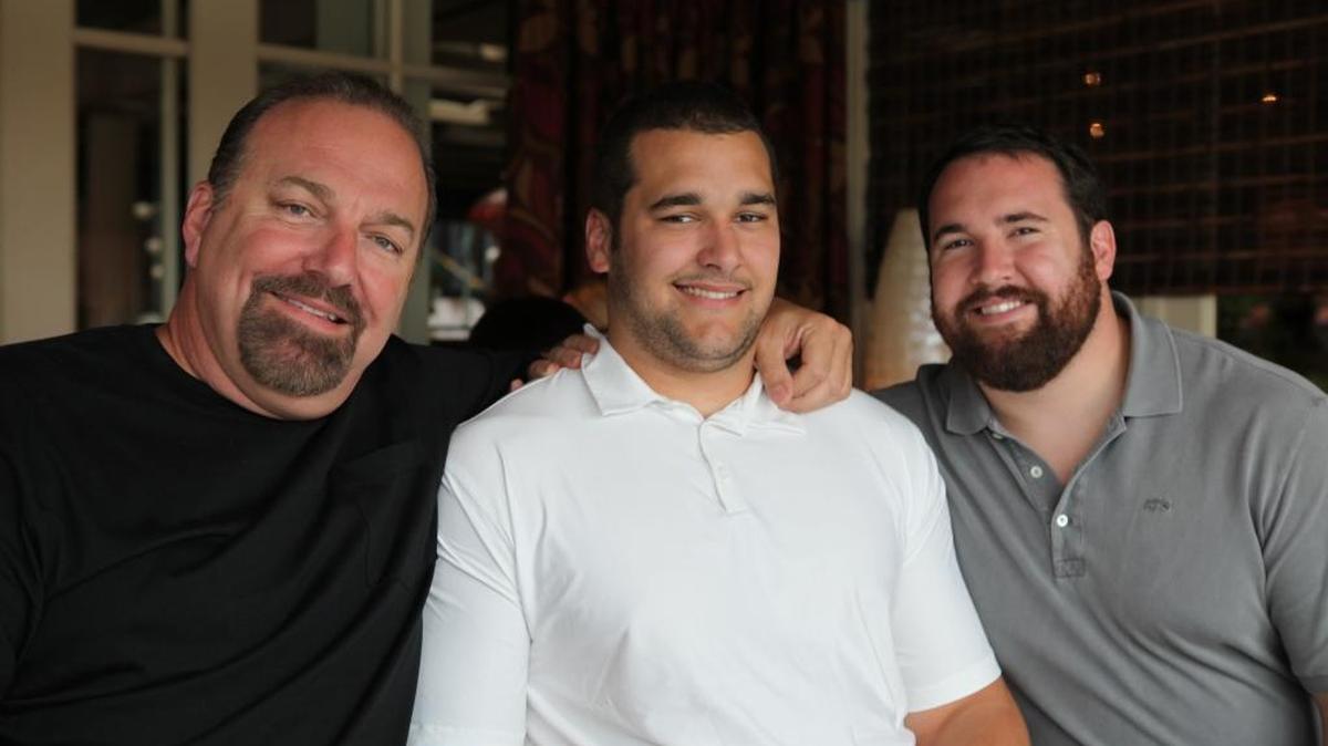 Frank Kalil with sons Matt (center) and Ryan (right) in a 2013 file photo. Thursday, Matt Kalil joined Ryan Kalil as a member of the Carolina Panthers.