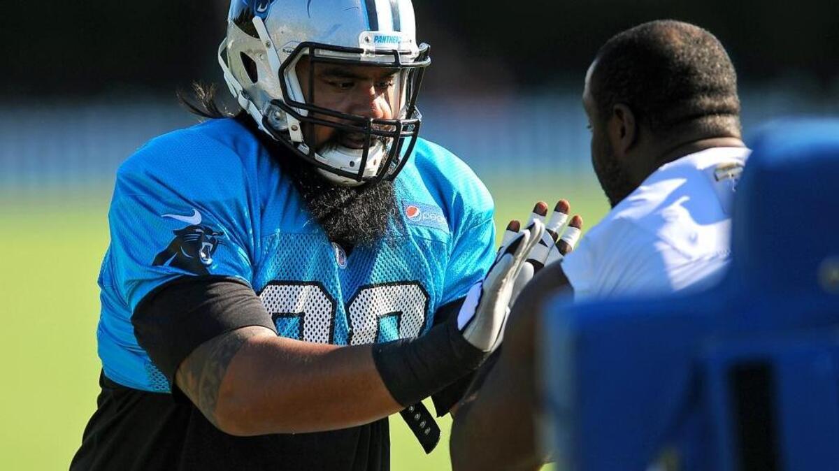 
Carolina Panthers defensive tackle Star Lotulelei, left, and defensive end Charles Johnson, right, work on technique during the Aug. 2 practice at Wofford College in Spartanburg.
