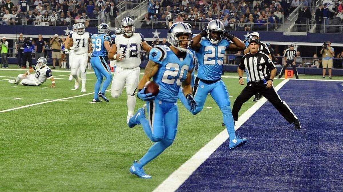 Carolina Panthers safety Kurt Coleman (20) had intercepted Dallas Cowboys quarterback Tony Romo and returned it for a touchdown before the game was a minute old.