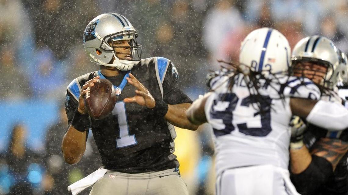 Carolina Panthers' Cam Newton (1) gets protection to throw downfield against the Indianapolis Colts in the second quarter at Bank of America Stadium on Monday, November 2, 2015.