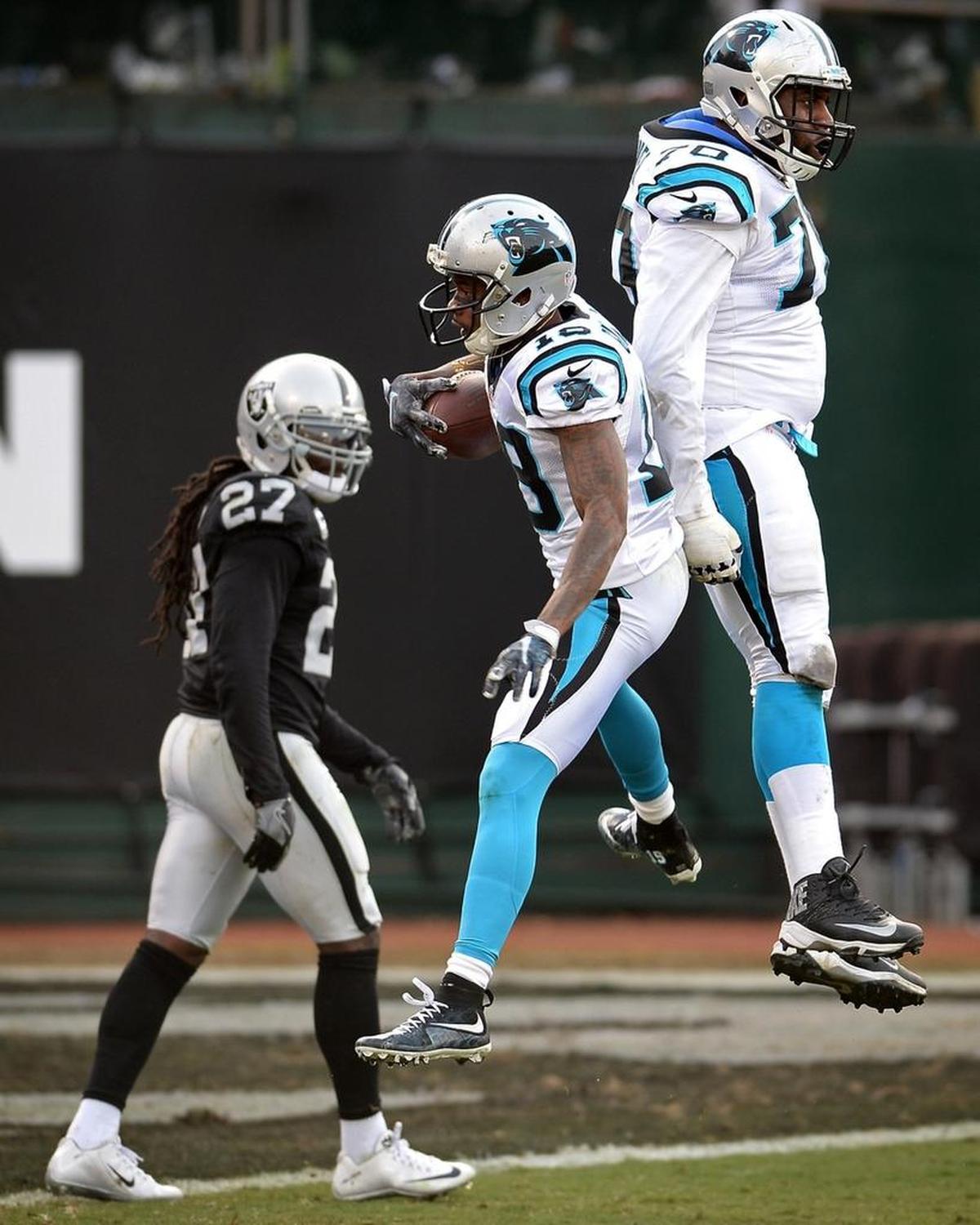 Carolina Panthers guard Trai Turner, celebrating with ex-receiver Ted Ginn Jr. during a loss at Oakland last season, is set to become a free agent after next season.