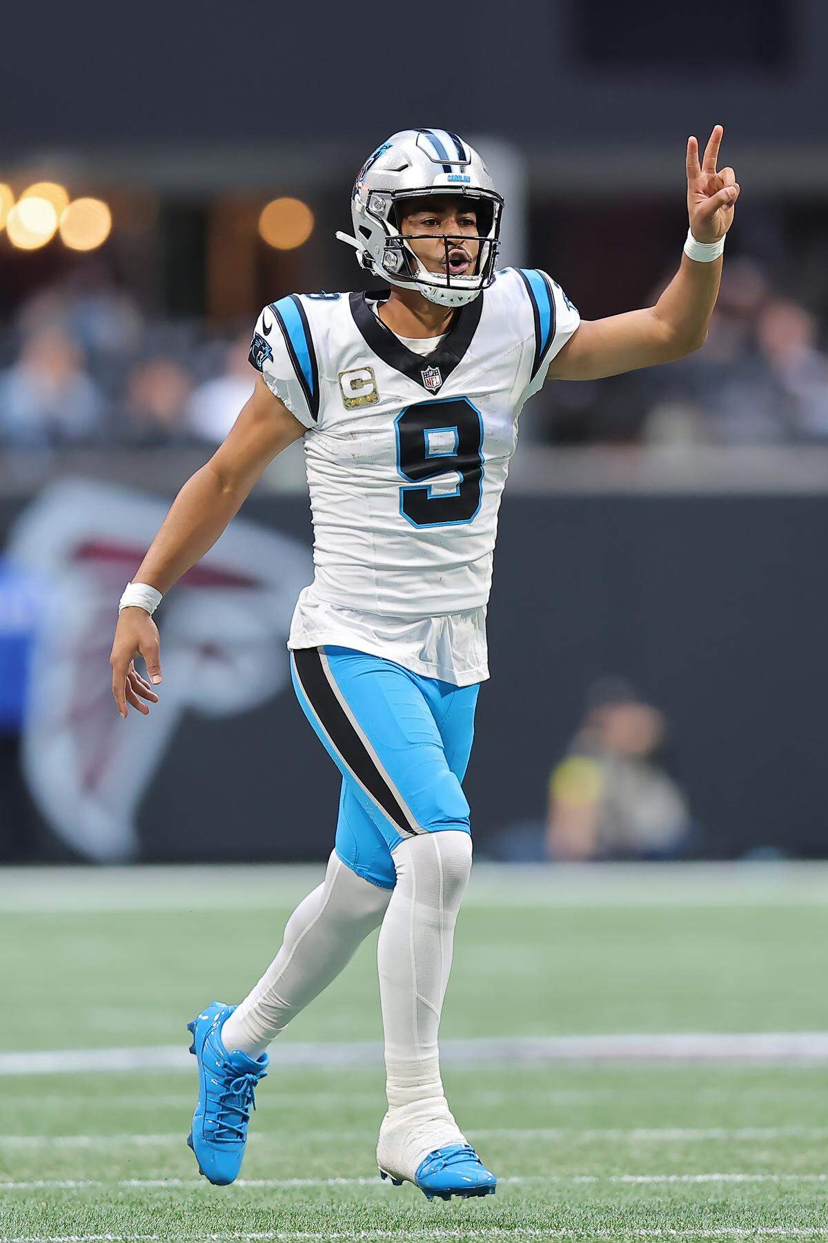 Bryce Young #9 of the Carolina Panthers calls for a two point conversion during the third quarter against the Atlanta Falcons at Mercedes-Benz Stadium on November 16, 2025 in Atlanta, Georgia.