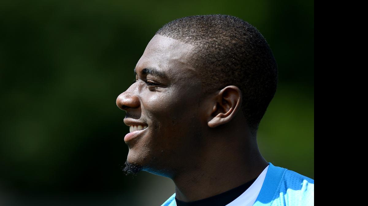 
Carolina Panthers wide receiver Devin Funchess jokes with teammates on Thursday, June 11, 2015.
