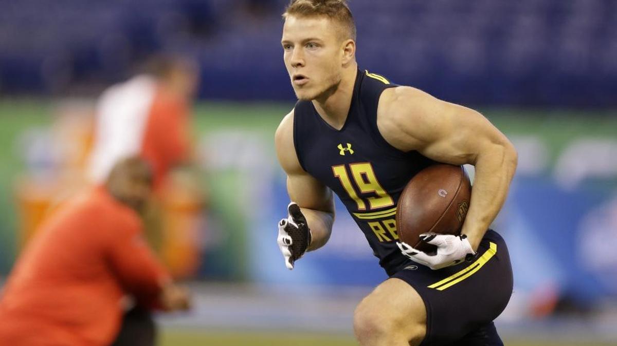 Stanford running back Christian McCaffrey runs a drill at the NFL football scouting combine in Indianapolis, Friday, March 3, 2017. (AP Photo/Michael Conroy).