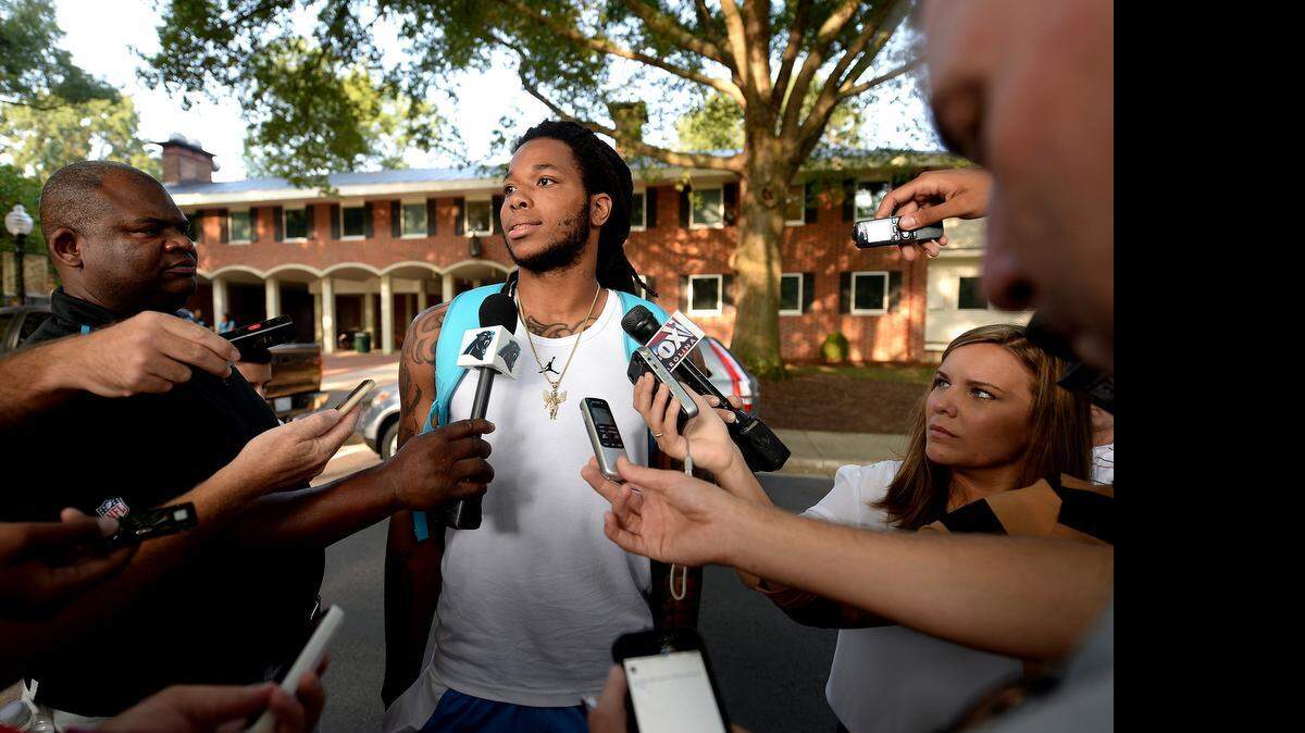 
Carolina Panthers wide receiver Kelvin Benjamin, center, showed up at training camp in Spartanburg saying he’s in good shape after being limited by hamstring injuries during OTAs and minicamp. 
