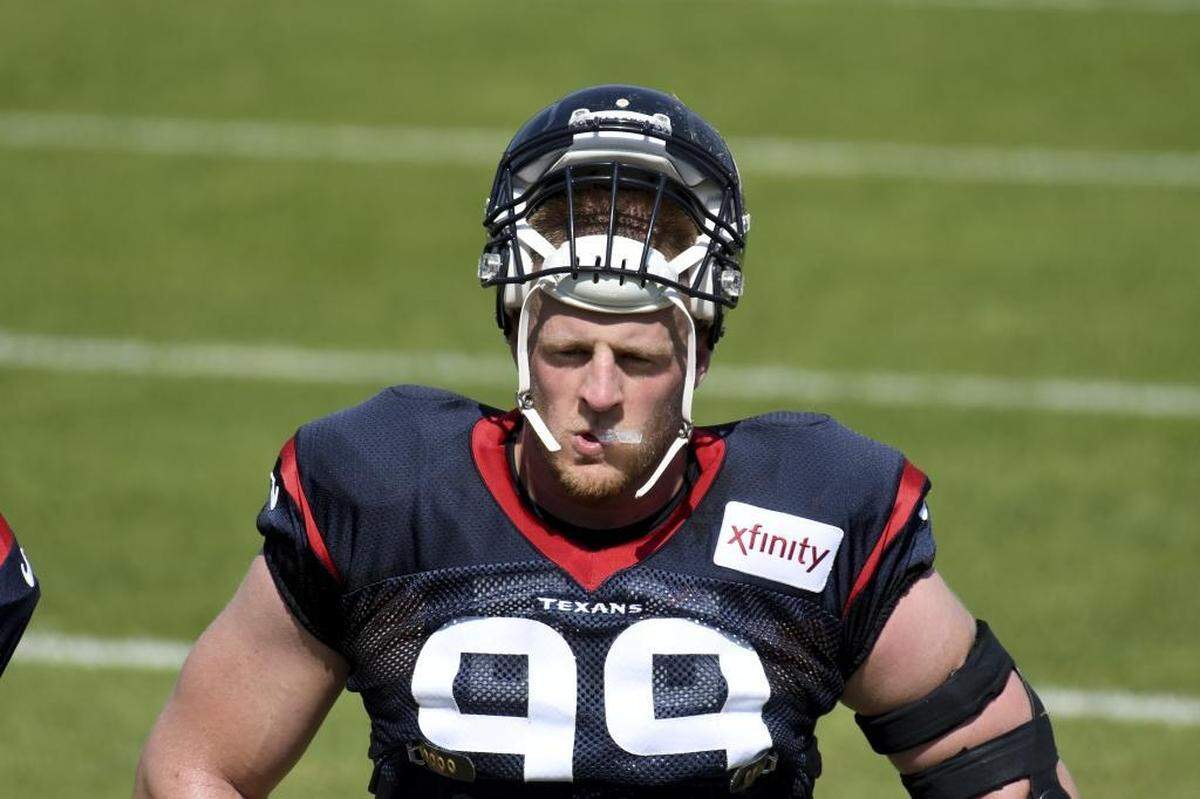 The Panthers will take a break from hitting each other Wednesday night for their first preseason game against the Texans and defensive end J.J. Watt, above.