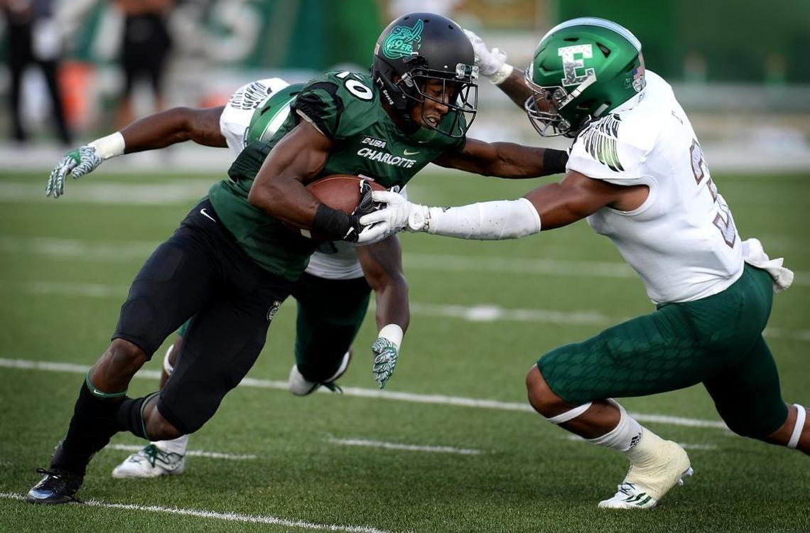 Austin Duke (left) led Charlotte in receiving each of his four years before signing as an undrafted rookie with the Carolina Panthers.