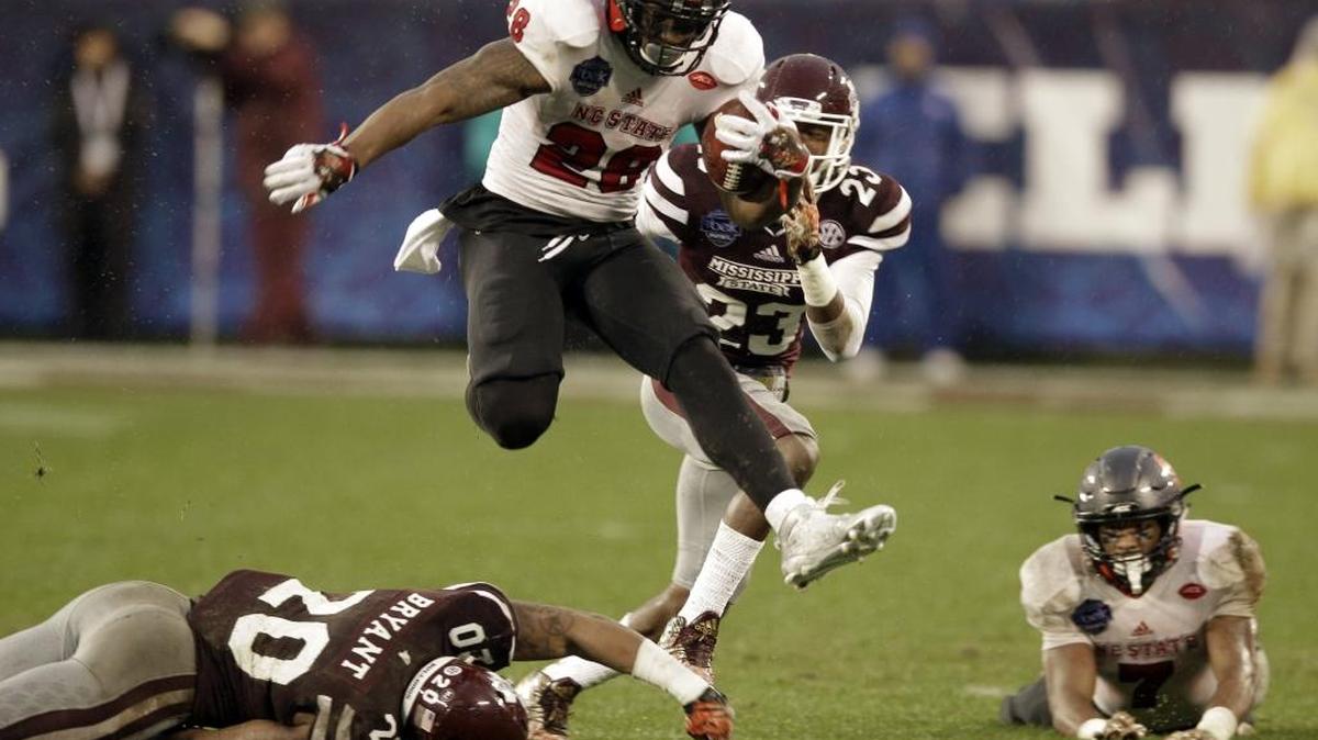 Carolina Panthers coach Ron Rivera said the Bank of America Stadium field held up well to Wednesday’s Belk Bowl between N.C. State and Mississippi State.
