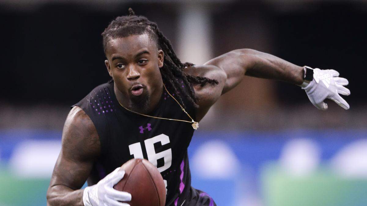 LSU defensive back Donte Jackson runs a drill at the NFL football scouting combine in Indianapolis, Monday, March 5, 2018. (AP Photo/Michael Conroy)