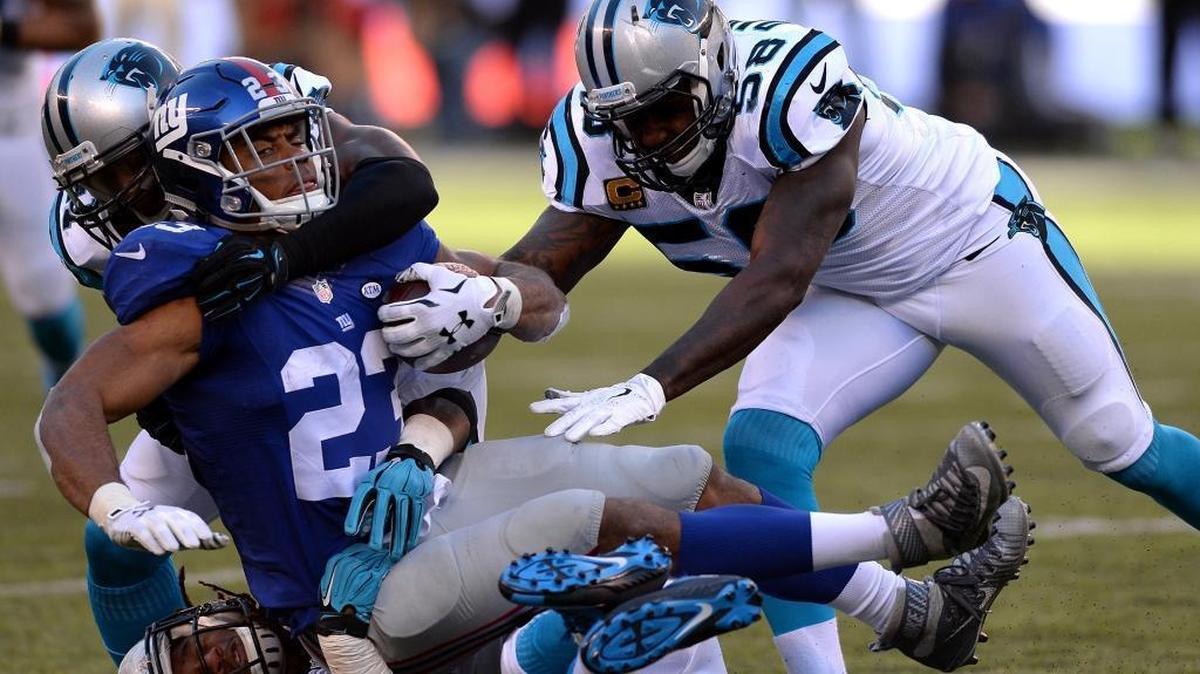 Carolina Panthers linebacker Thomas Davis, right, was voted to his first Pro Bowl Tuesday. He’s one of a team-record 10 selections.