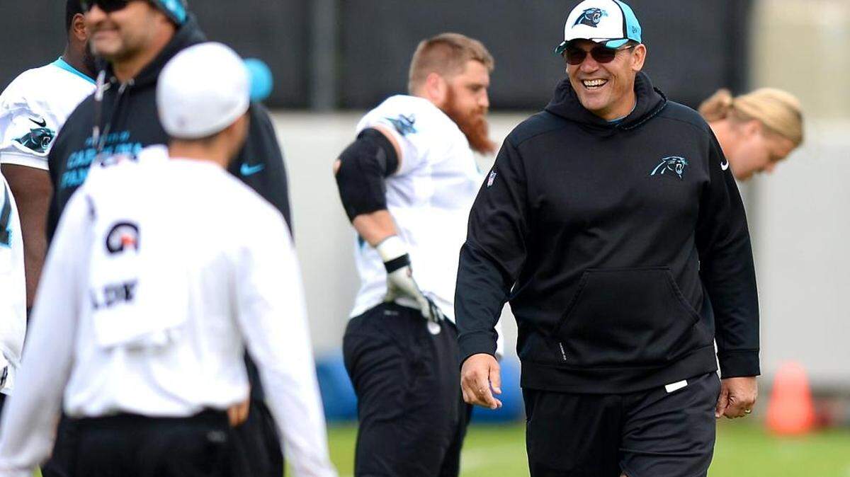 Carolina Panthers head coach Ron Rivera, right, says Thomas Davis is finally getting the consideration for postseason accolades he deserves.