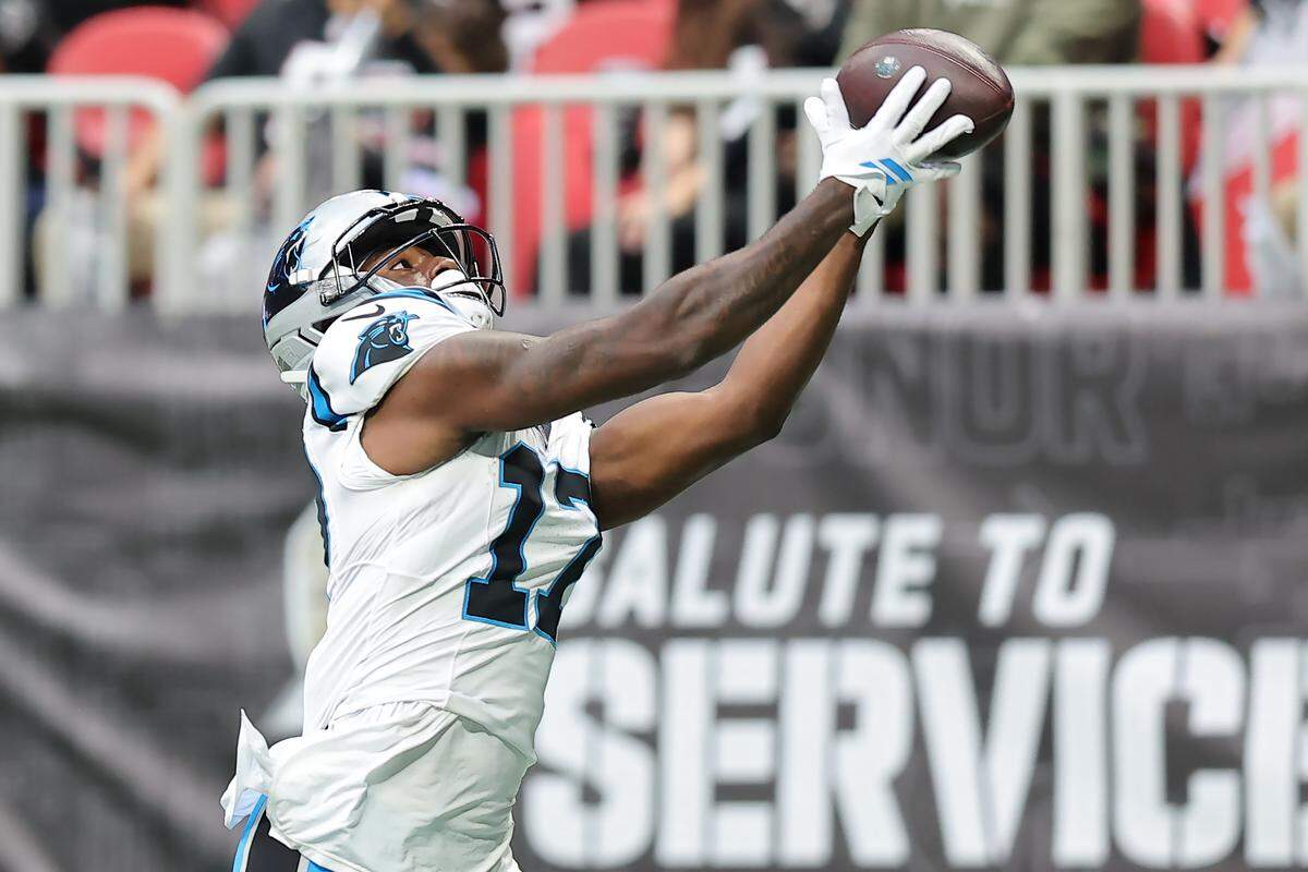 Xavier Legette of the Carolina Panthers catches a 36-yard touchdown pass during the third quarter against the Atlanta Falcons at Mercedes-Benz Stadium on Nov. 16, 2025, in Atlanta, Georgia. The Panthers won, 30-27, in overtime.
