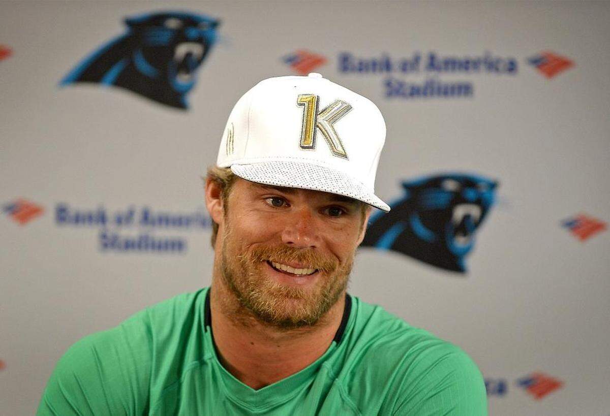The Panthers have added $2 million in incentives to tight end Greg Olsen’s contract, his agent Drew Rosenhaus told the Observer on Thursday. Above, Olsen, the only tight end in NFL history to post three consecutive 1,000-yard receiving seasons, wears a hat earlier this month marking that feat.