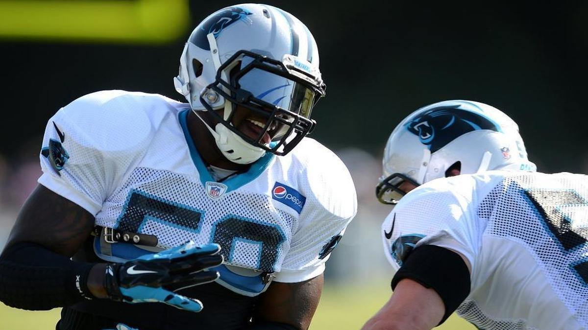 Carolina Panthers linebacker Thomas Davis, left, has endured three ACL tears, but they reduced the NFL mileage on his body.