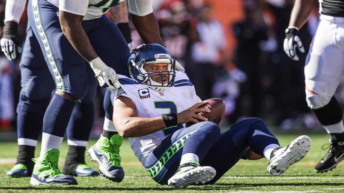 
Seattle Seahawks quarterback Russell Wilson has been sacked 22 times this season, but he also leads all NFL quarterbacks in rushing yards. 
