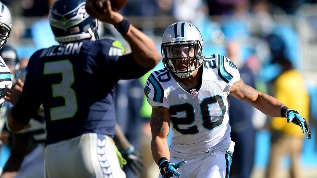 The Carolina Panthers and safety Kurt Coleman (20) had a difficult time stopping Seattle Seahawks quarterback Russell Wilson (3) in the second half on Sunday.