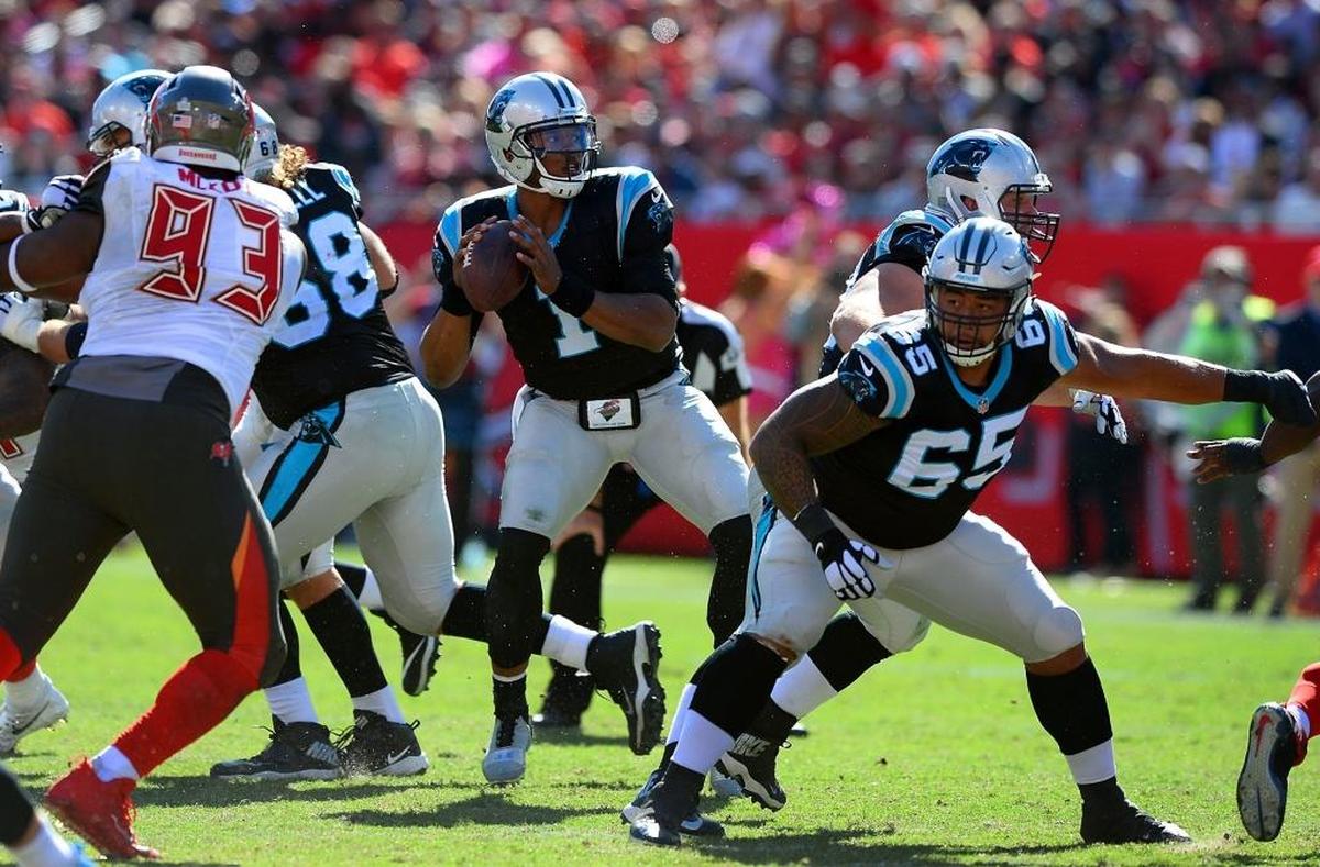 Carolina Panthers quarterback Cam Newton drops back Sunday on a play that would eventually result in his one touchdown pass on the day -- a 25-yarder to Kelvin Benjamin. Newton threw for a modest 154 yards Sunday and ran for 44 more.