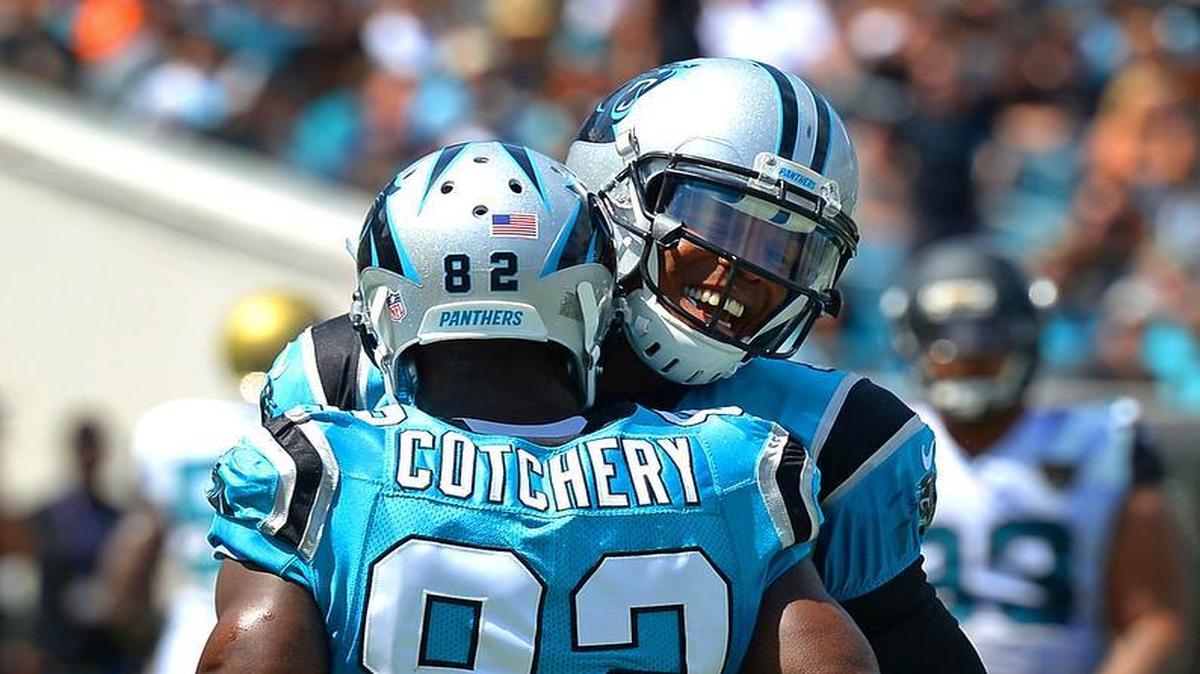 
Carolina Panthers wide receiver Jerricho Cotchery, back to camera, celebrates his seven yard touchdown pass reception with quarterback Cam Newton, facing camera, during second quarter action vs the Jacksonville Jaguars at EverBank Field in Jacksonville, FL on Sunday, September 13, 2015. The Panthers led the Jaguars 10-9 at the half. 

