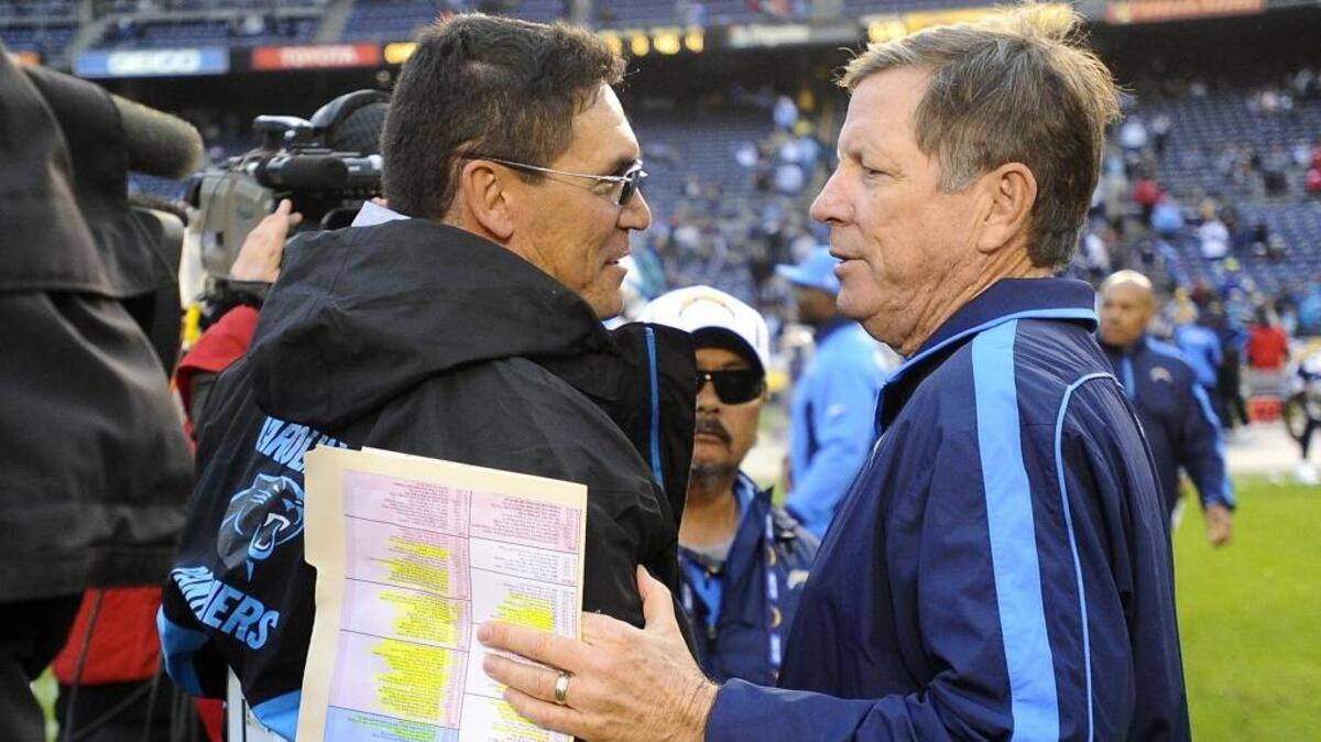 The familiarity between Carolina Panthers head coach Ron Rivera (left) and Norv Turner, who was with Rivera with the San Diego Chargers, was a key factor in Turner’s decision to return to the NFL.