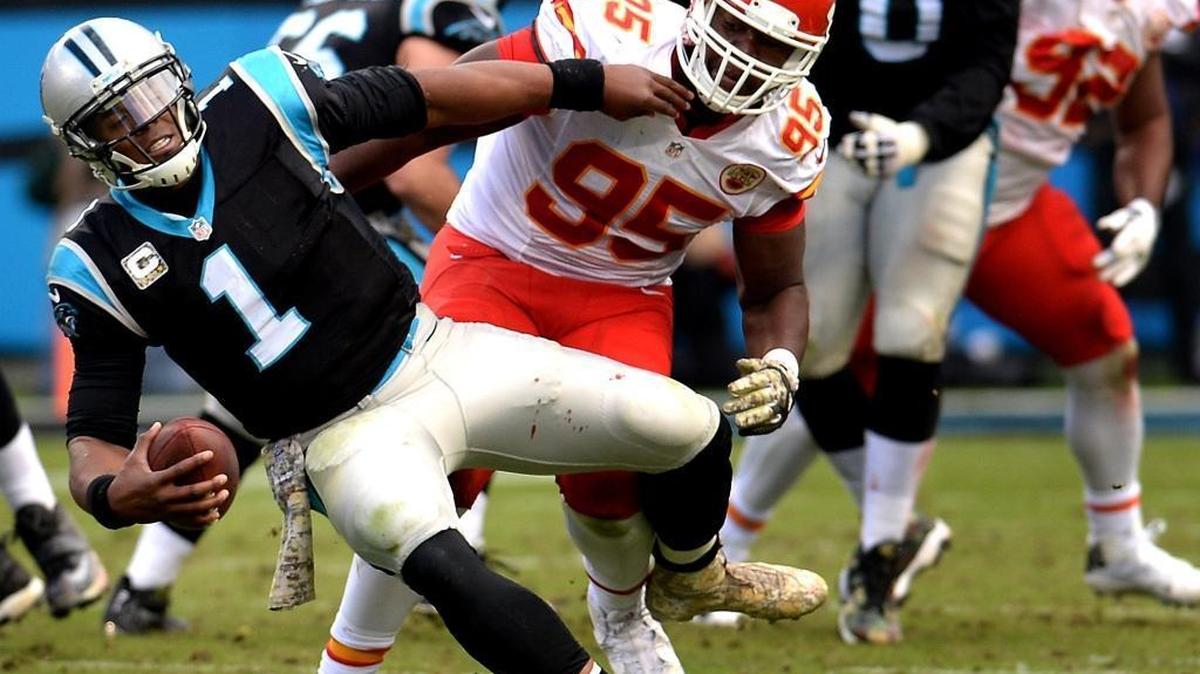 Carolina Panthers quarterback Cam Newton (1) is sacked by Kansas City Chiefs defensive lineman Chris Jones, one of two sacks that moved the Panthers out of field goal range on a 20-play drive in the third quarter.