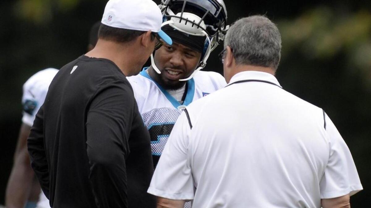 From left, Carolina Panthers coach Ron Rivera, corner Josh Norman and general manager Dave Gettleman are