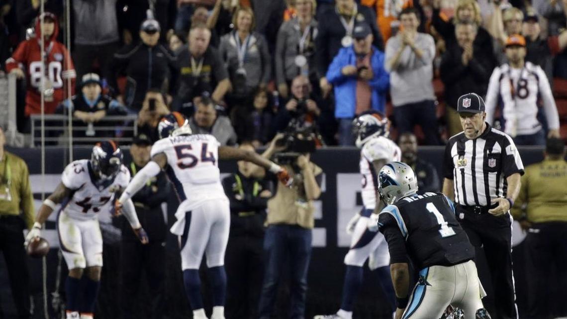 Carolina Panthers quarterback Cam Newton (1) sits on the field after he fumbled the ball late in Super Bowl 50 on Sunday. Some are questioning his effort to recover the ball.