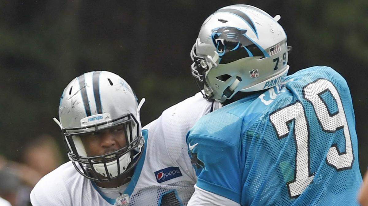 Carolina Panthers defensive end Daeshon Hall (94) runs a play against defensive tackle Quinterrius Eatmon (79) during practice at training camp at Wofford College in Spartanburg, SC on Thursday, August 2, 2018.