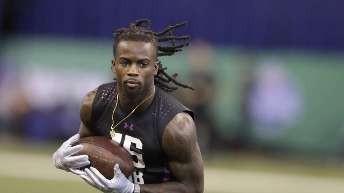 LSU defensive back Donte Jackson runs a drill during the NFL football scouting combine, Monday, March 5, 2018, in Indianapolis. (AP Photo/Darron Cummings)