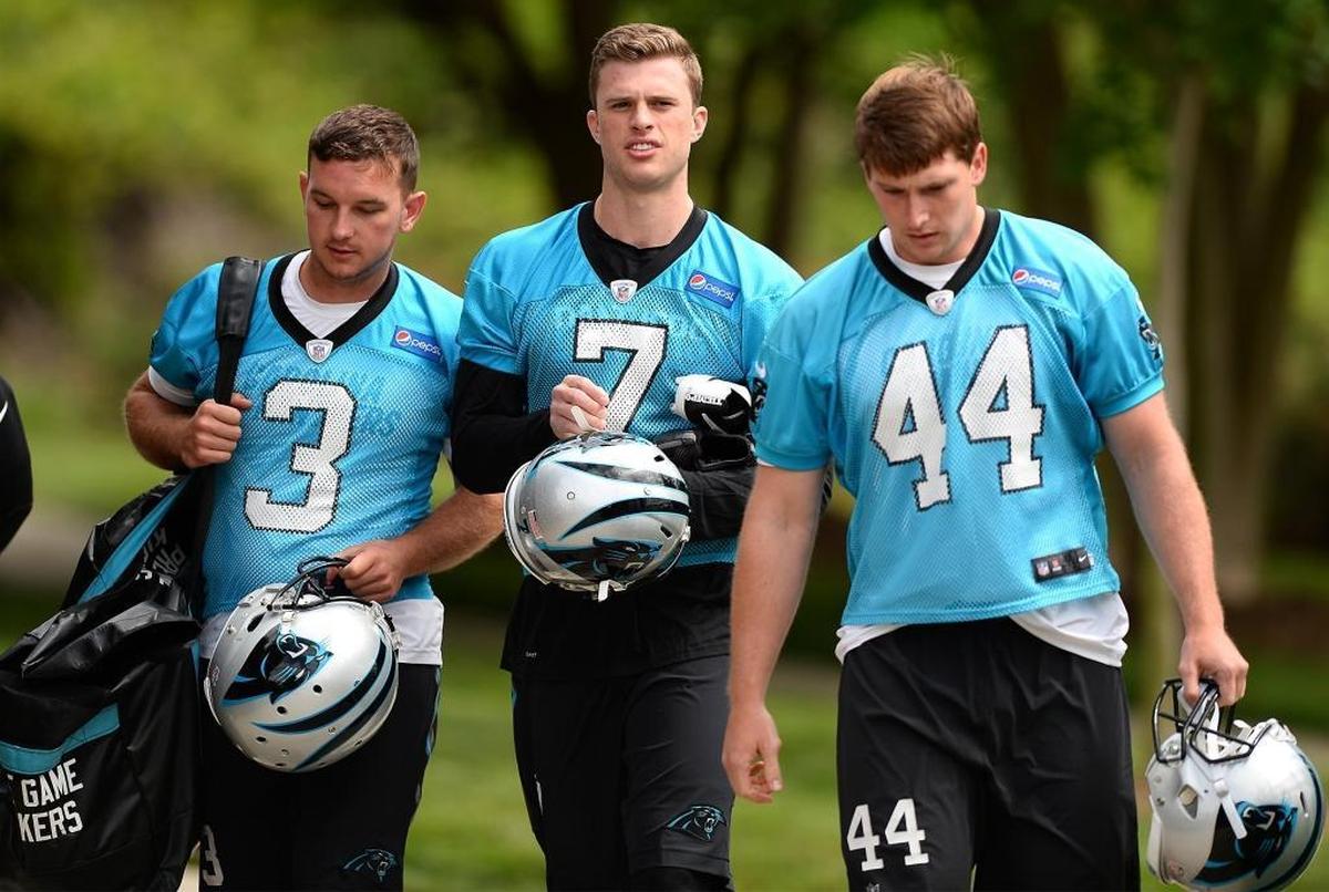 Carolina Panthers rookie Harrison Butker, center, the first drafted kicker in Panthers’ history, walks to Friday’s second session of rookie minicamp practice with punter Hayden Hunt, left, and long snapper Daniel Dillon.