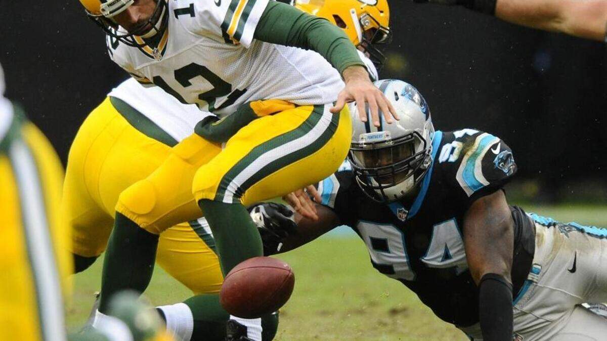 Carolina Panthers defensive end Kony Ealy (94), who had a strip sack of Green Bay Packers quarterback Aaron Rodgers (12) on Sunday, said after the game he stands with his former Missouri teammates and coaches in their strike against the school’s president.