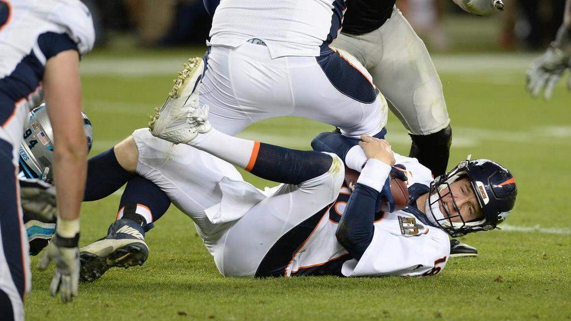 Peyton Manning is dropped to the turf in the third quarter at Levi's Stadium in Santa Clara, CA for Super Bowl 50 Sunday, February 7, 2016.