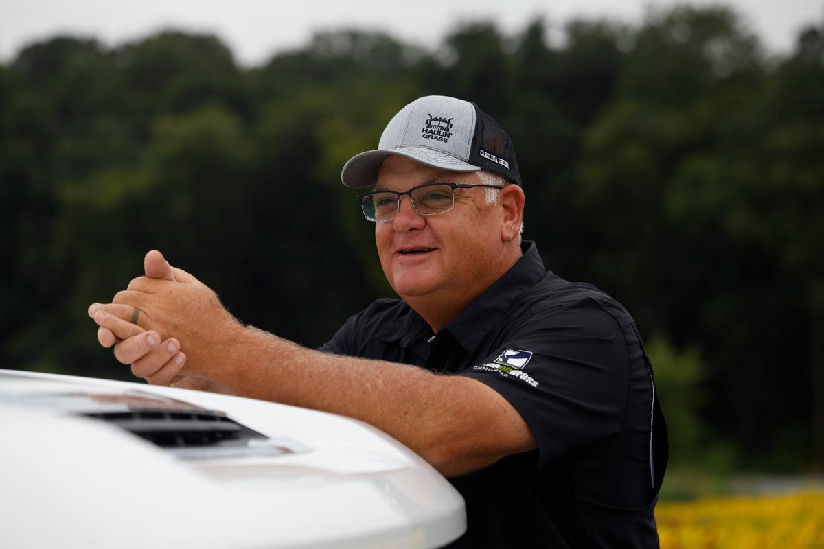 Chad Price, President of Carolina Green Corp, smiles as he talks about his business at his grass farm in Fairview, NC on Friday, July 26, 2024. Carolina Green Corp grows premium sod, works with Charlotte FC, Carolina Panthers, Kansas City Chiefs and many more college and professional teams across the country.