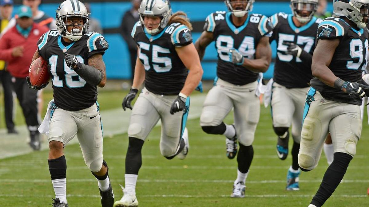 Carolina Panthers Damiere Byrd, left, runs back a Tampa Bay Buccaneers kickoff during second quarter action at Bank of America Stadium in Charlotte, NC on Sunday, December 24, 2017. Byrd ran the ball back for 103 yards.