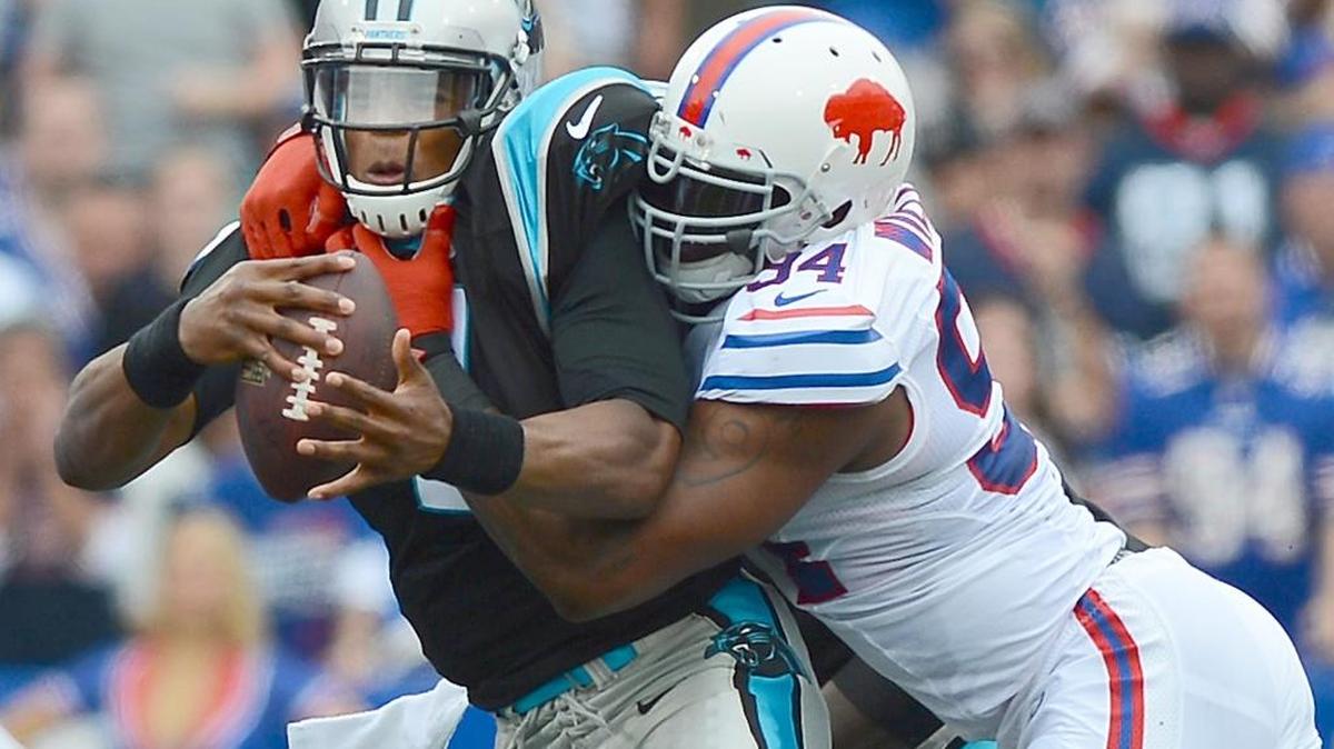 
Carolina Panthers (1) quarterback Cam Newton is sacked by Buffalo Bills (94) defensive end Mario Williams during second quarter action at Ralph Wilson Stadium in Orchard Park, NY on September 15, 2013. The Bills defeated the Panthers 24-23.
