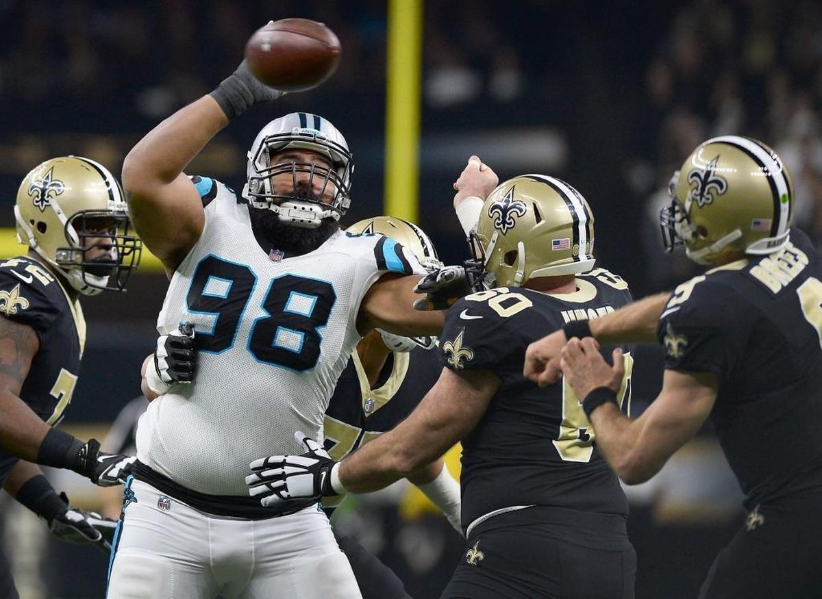 Carolina Panthers defensive tackle Star Lotulelei rushes in attempt to block a pass by New Orleans Saints quarterback Drew Brees during first quarter action in NFL Wild Card action on Sunday, January 7, 2018 at the Mercedes-Benz Superdome in New Orleans, LA.