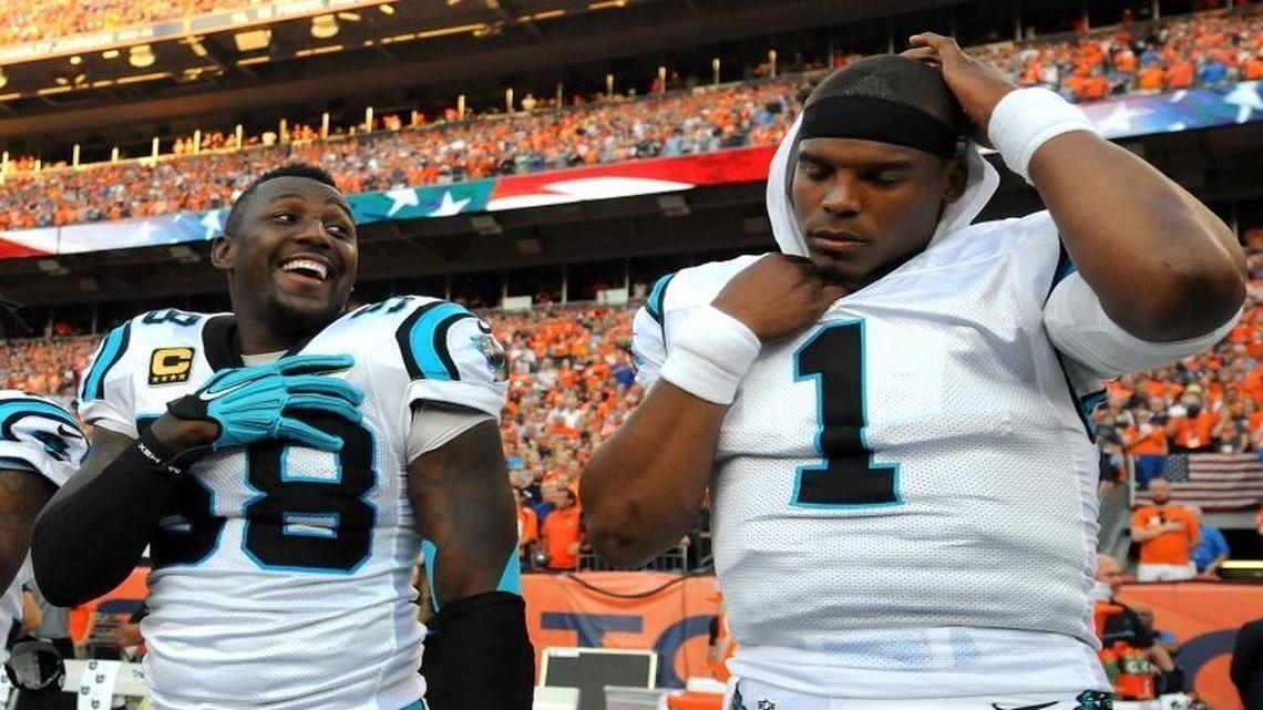 Carolina Panthers linebacker Thomas Davis, center, told SI Now’s Maggie Gray he would roll out the welcome mat for quarterback Colin Kaepernick if teammate Cam Newton, right, sustained an setback in his return from shoulder surgery.