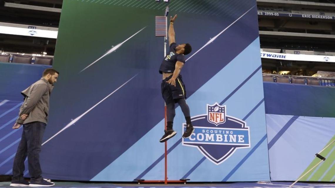 Texas A&M defensive end Myles Garrett runs a drill at Sunday’s NFL football scouting combine in Indianapolis.